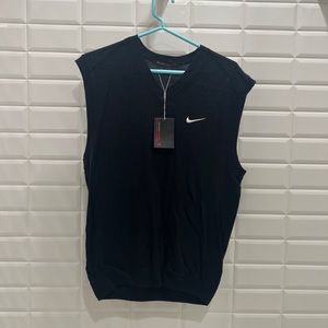 nike tiger woods collection golf shirt. 
Never worn with tags
Wool